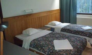 Фото номера Стандартный семейный номер Отель Hotel Tulikettu г. Соткамо 4