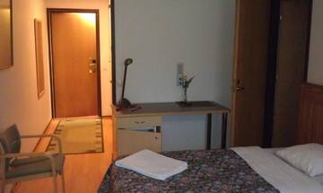 Фото номера Стандартный семейный номер Отель Hotel Tulikettu г. Соткамо 2