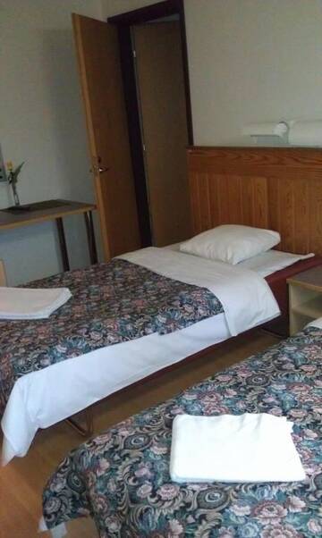 Фото номера Стандартный семейный номер Отель Hotel Tulikettu г. Соткамо 3