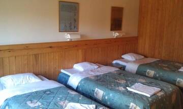 Фото номера Стандартный трехместный номер Отель Hotel Tulikettu г. Соткамо 2