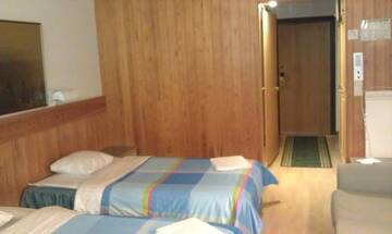 Фото номера Стандартный трехместный номер Отель Hotel Tulikettu г. Соткамо 4
